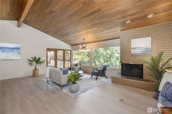 Vaulted ceilings and mid-century modern vibes. Fireplaces on both levels of the home. Vaulted ceilings and mid-century modern vibes. Fireplaces on both levels of the home.