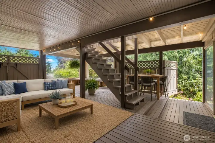Lower deck off basement: digitally staged. Lower deck off basement: digitally staged.