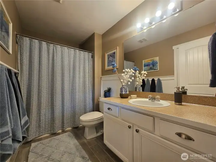 Main upstairs full bath Main upstairs full bath