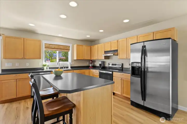 Open kitchen with "miles of counter space"