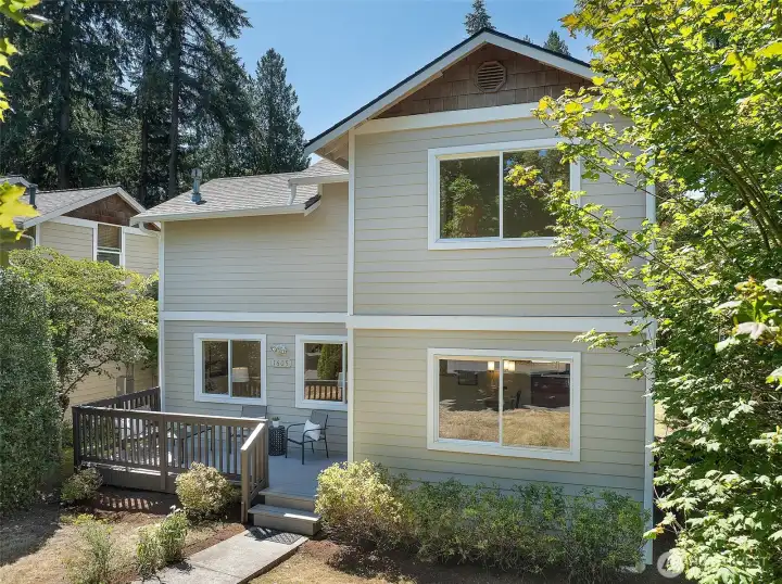View of the back of the home with spacious deck