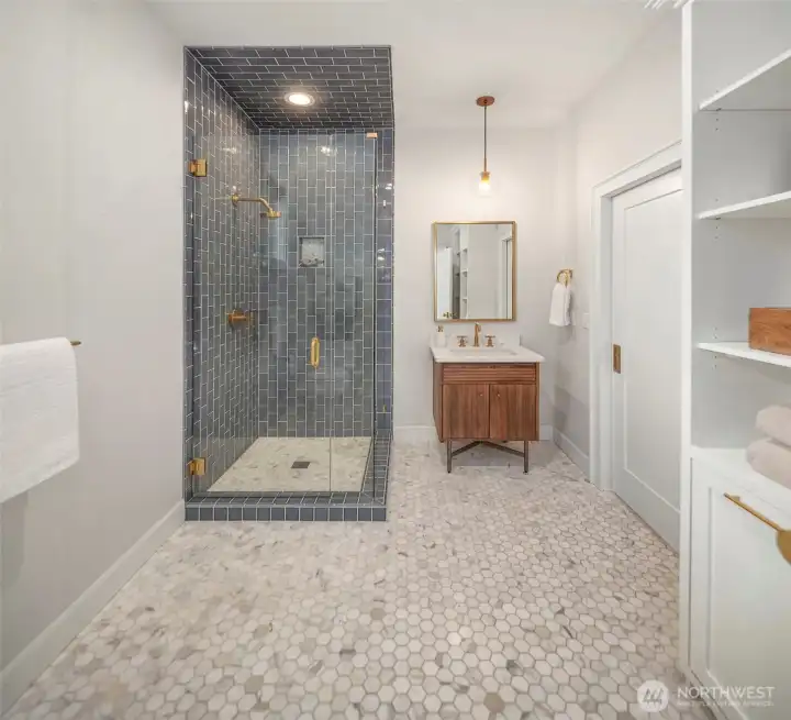3/4 main floor bath which has direct access from both the kitchen and the bonus flex space.