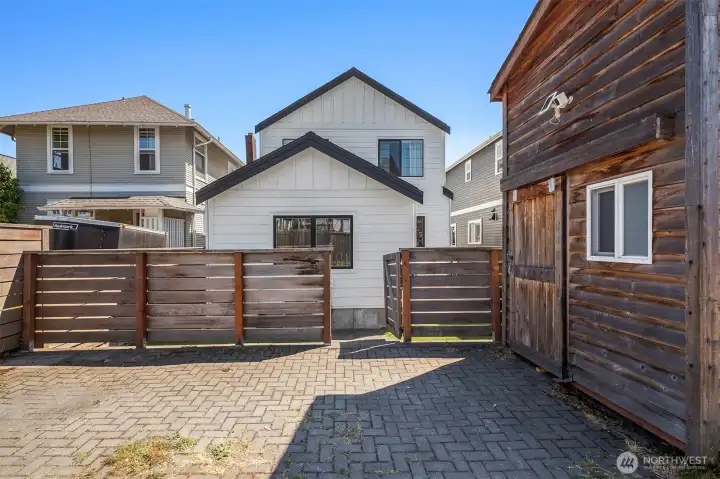 Parking off the alley and storage shed.