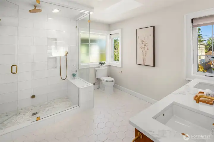 The large shower is a steam shower.