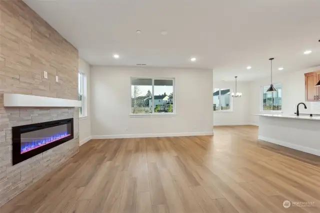 Looking across Great room through kitchen at dining.