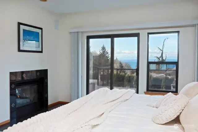 Glass doors lead to the view deck. Wake to your mountain and sound views!