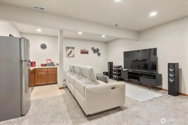 Lower Level Media room complete with Wetbar. Easily converted into an ADU or multi-generational living!