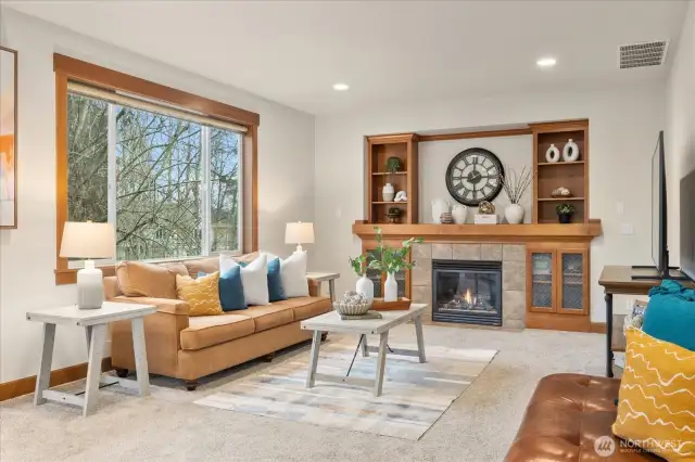 Bright Main Level Living space overlooking the backyard and nature preserve. Just intime for the leaves to bloom for even more privacy!