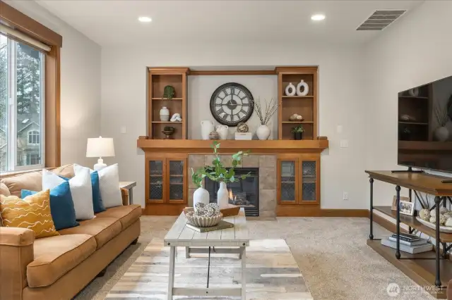 Custom Built-Ins surround the gas fireplace.