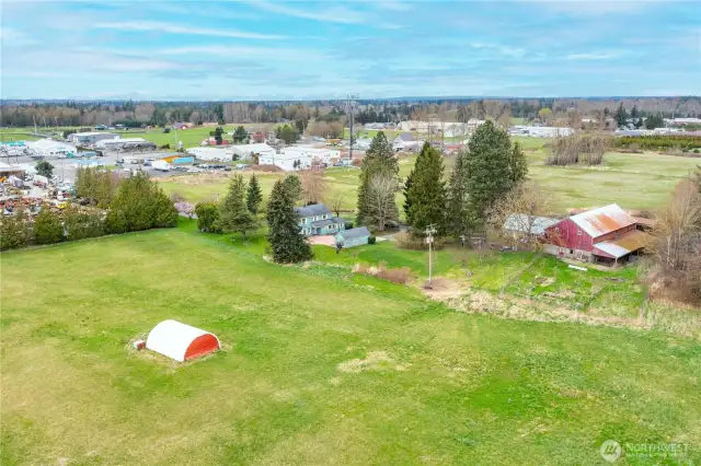 Looking NW, notice the large garden area next to the barn. So much space to create the farm of your dreams!
