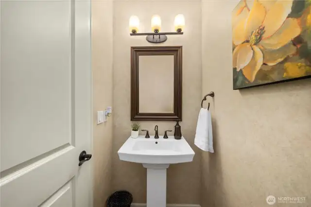 Stylish half bath for guests!