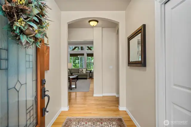 Soaring ceilings and huge windows fill the home with natural light and create  an open, airy feel