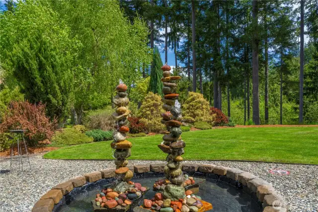 Don’t miss the beautiful, peaceful custom fountain and inground sprinkler system