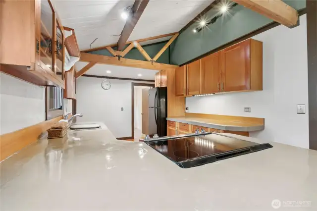 kitchen with high ceilings and custom cabinets
