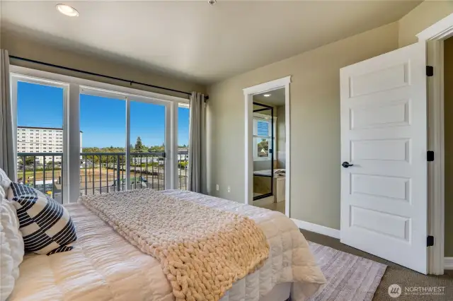 Unwind in your private ensuite—featuring a relaxing soaking tub and generous walk-in closet.