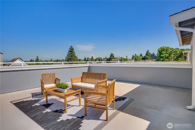 Rooftop serenity with stunning vistas—from mountain sunrises to sparkling city lights.