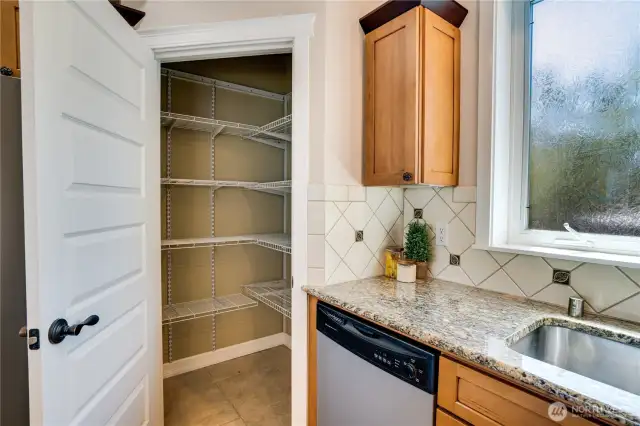 Large corner pantry for kitchen storage for your Costco run.