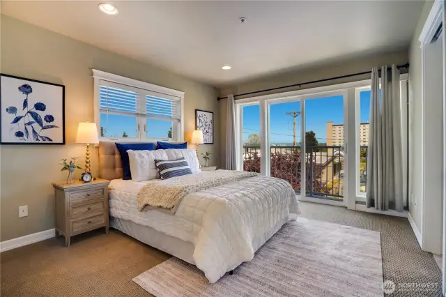 Primary suite upstairs has plenty of room for your California King bed.