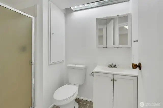 Convenient lower level three quarter bath.
