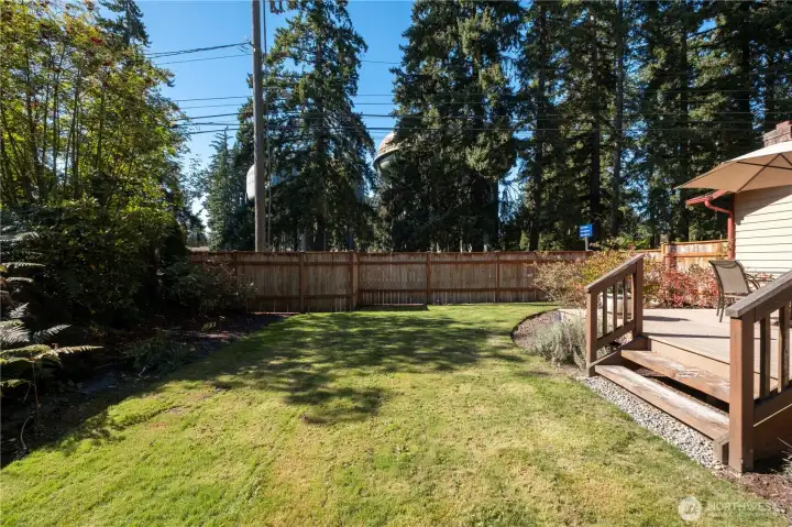 Mature landscaping in the rear yard provides privacy.
