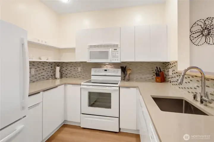 Ample cabinet space ensures that everything has its place here.