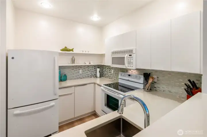 Stylish open shelving gives you more storage space and the chance to display all your favorite dishes or barware.