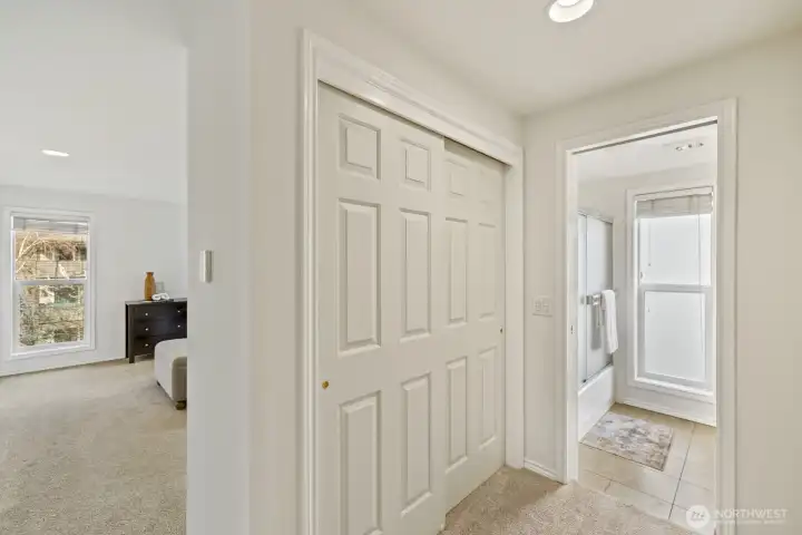 View from Entrance to Primary BR Suite, featuring an En-Suite Full BA, and Three Full Closets!