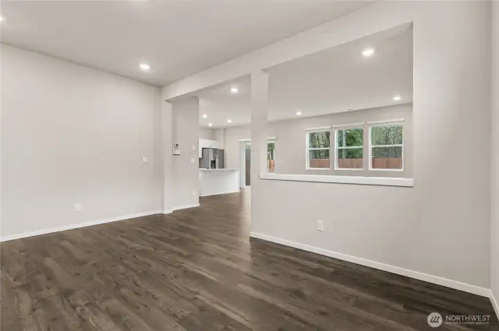 Formal dining room opens up to the great room, Photo not of actual home. This is another home in the community of the same plan and style.