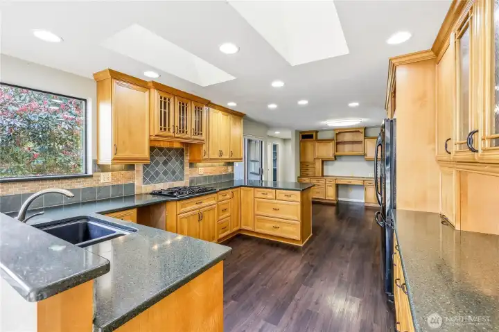 Cabinets, cabinets, Omega cabinets. So much kitchen storage, you might start buying lots of Le Creuset.