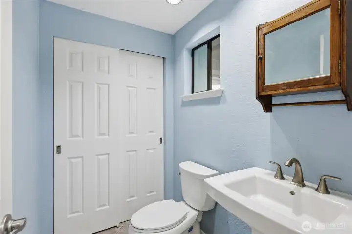 Half bath off of entry. This is a second half bath on the main level.