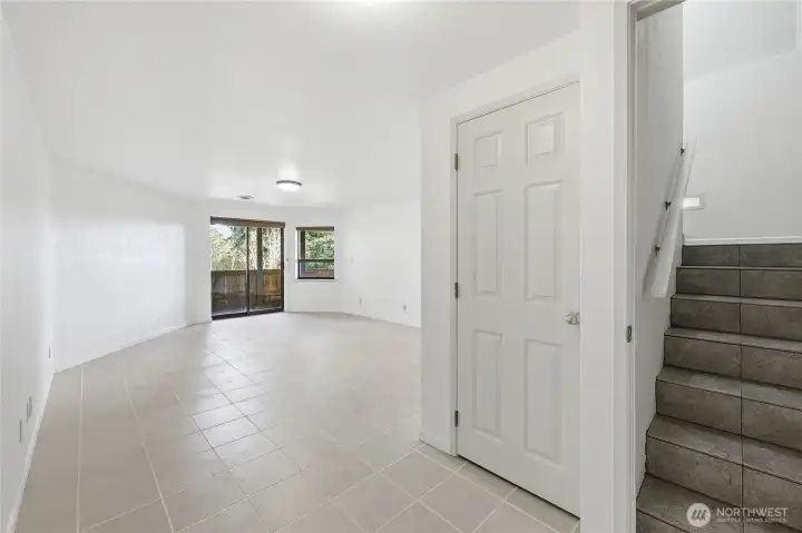 Remember those stairs after the foyer? This is where they go. To the REC ROOM we go!