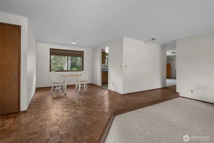 Enter in through front door into living room and dining room area.