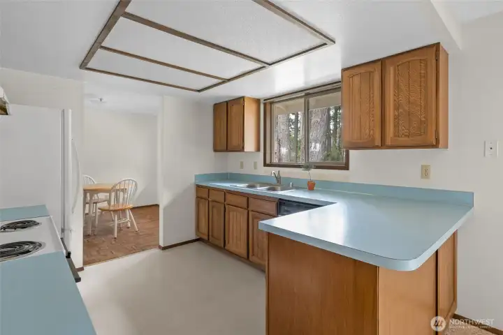 Kitchen with breakfast bar.