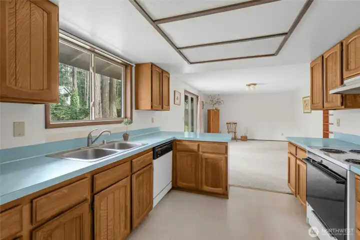 Kitchens opens to family room.