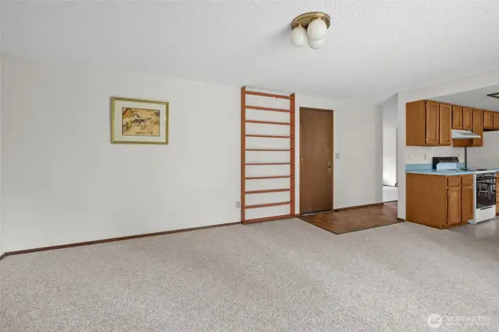 Family room with door to garage.