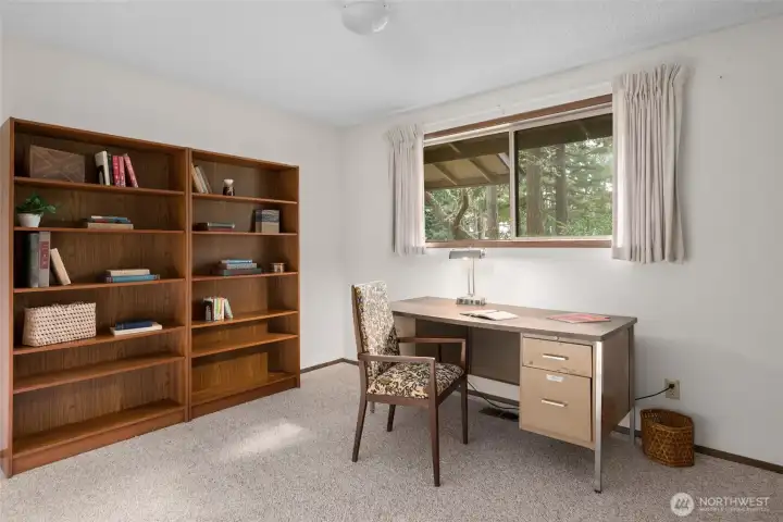 Bedroom #4 is being used as an office in this picture.