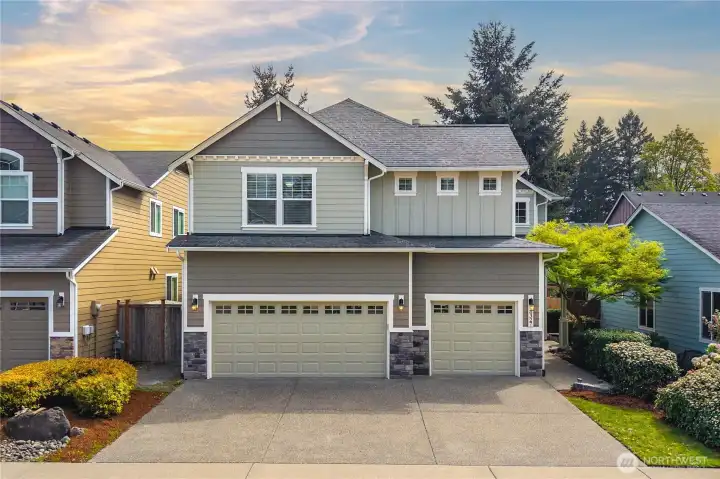 Located on a tree-lined street with sidewalks