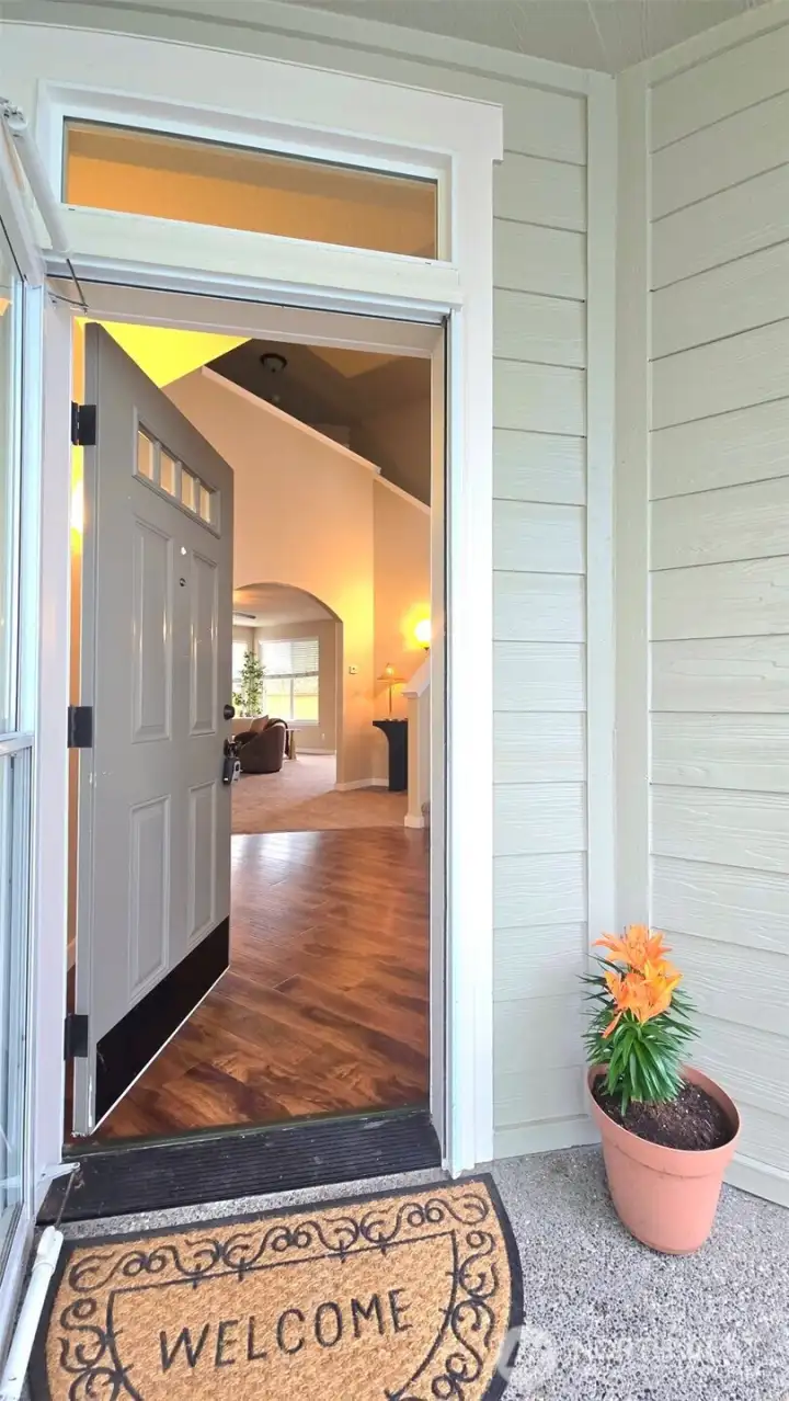 A covered front porch welcomes visitors