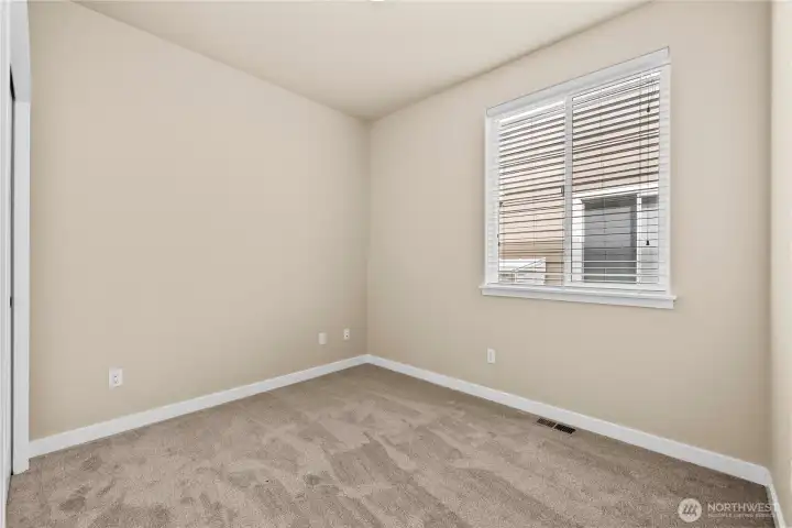 Use the main-floor bedroom adjoining the fam,ily room as an office or guest room