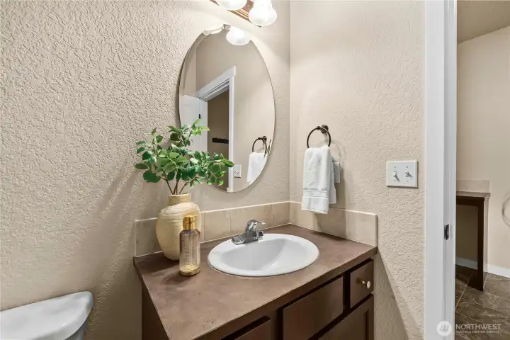 Half bath next to the utility room
