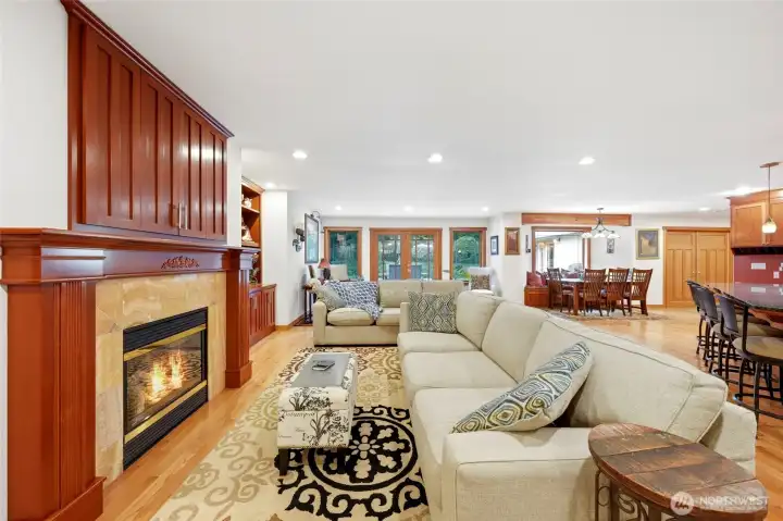 Spacious living area with vaulted ceilings and natural light.