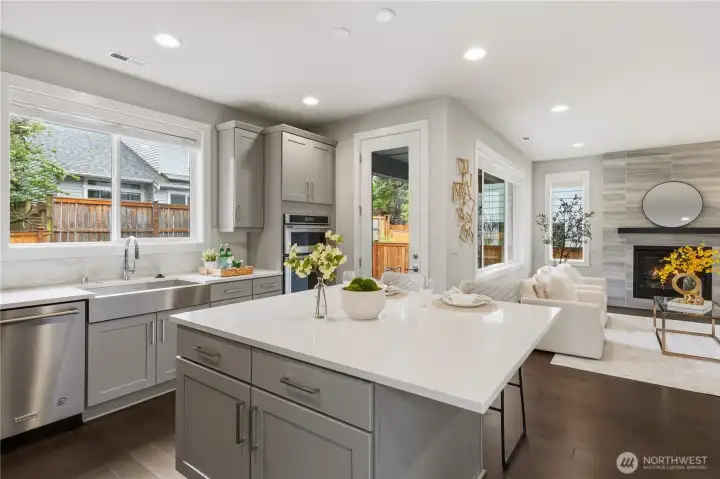 Family room with fireplace and backyard access