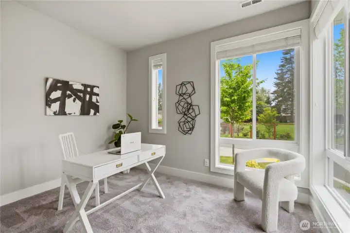 Den or guest bedroom with closet on main floor