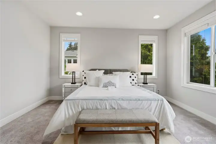 Primary Bedroom with windows allowing natural light