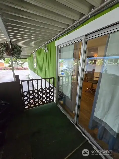 Slider off kitchen area to covered patio