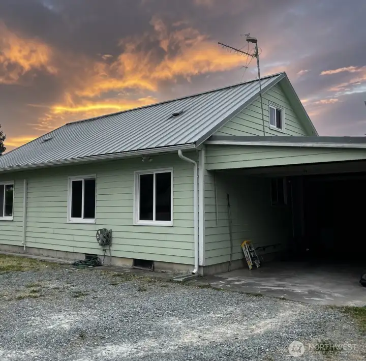 Side of the house showing carport