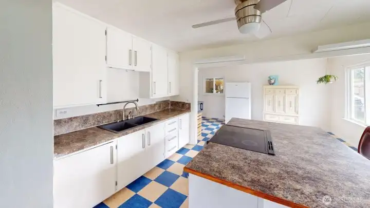 Kitchen looking toward door to carport