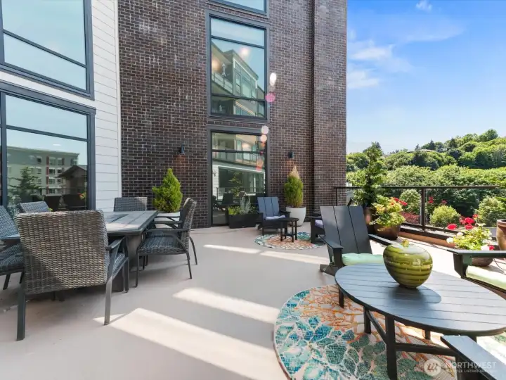Community room connects to an expansive deck with plenty of seating, fire-pit, and bbq. Perfect for summer gatherings Community room connects to an expansive deck with plenty of seating, fire-pit, and bbq. Perfect for summer gatherings