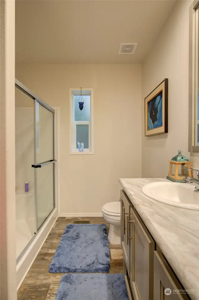 3/4 bath is centrally located for easy access from the entertainment area & bedrooms.