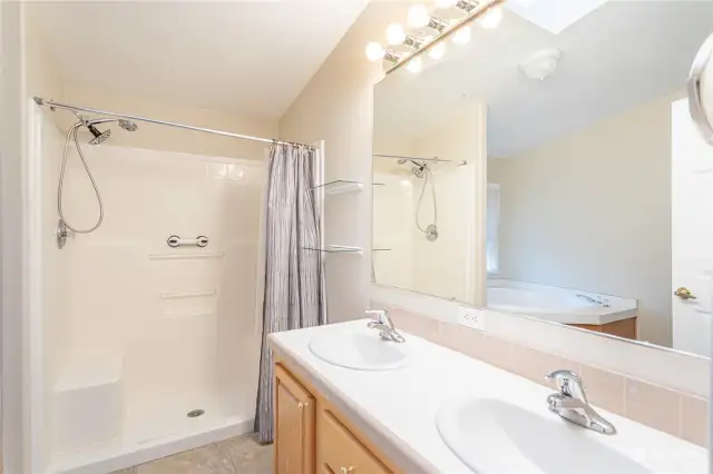 Primary bathroom with large garden soaking tub also